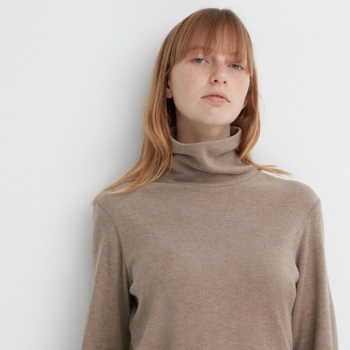 camisetas térmicas uniqlo heattech con mangas de polar para mujer